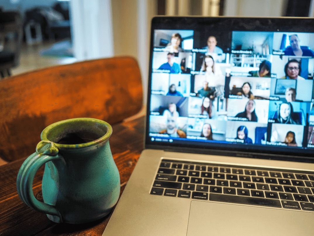 Laptop on wooden table for online studies at Australian universities