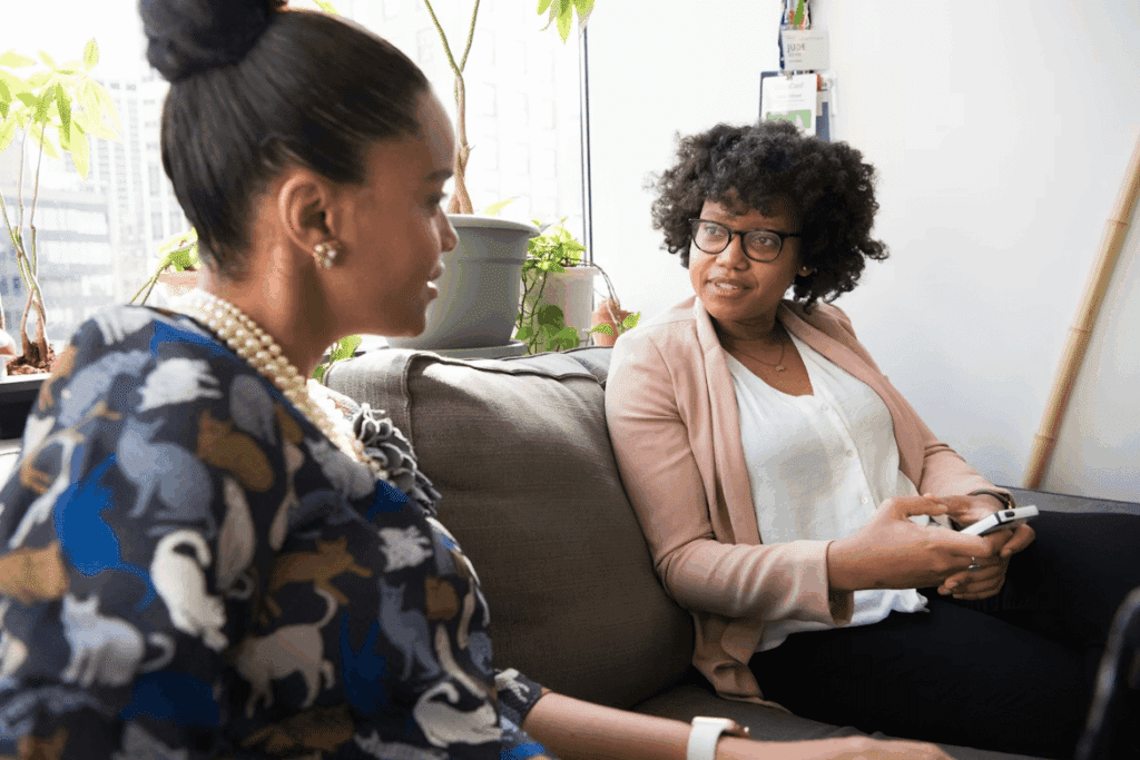 Two women playing video games on a