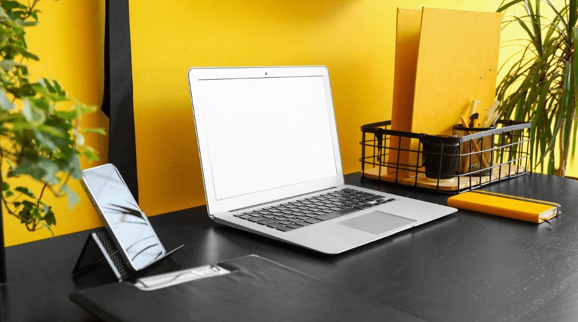 Laptop on a desk, representing productivity